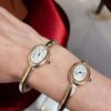 Montre Femme Élégance Royale – Bracelet Doré & Cadran Ovale avec Cristaux Brillants